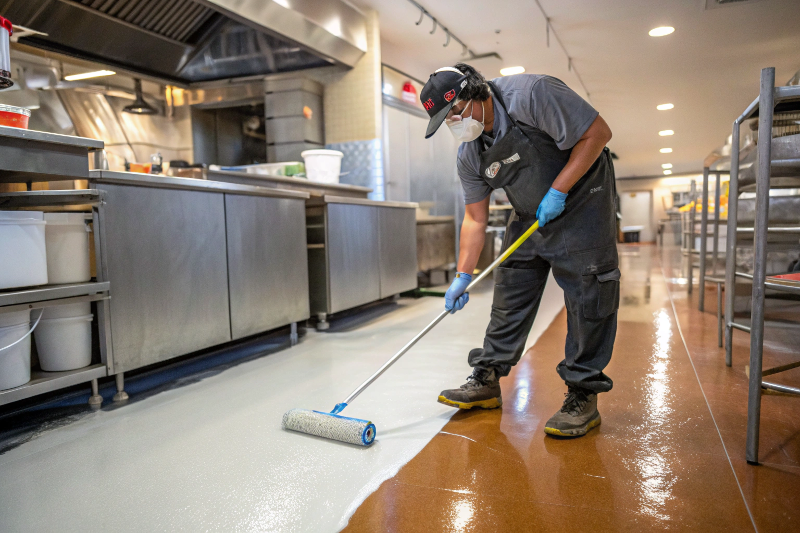 non-porous epoxy restaurant floor surface showing food-safe properties in commercial kitchen