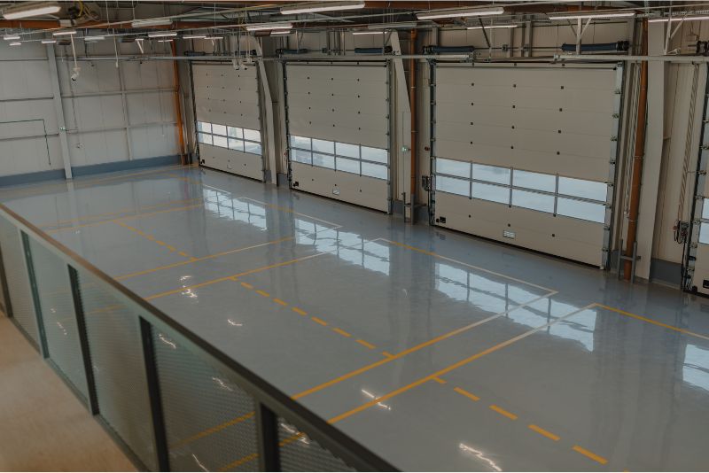 A photo of an empty finished up epoxy flooring