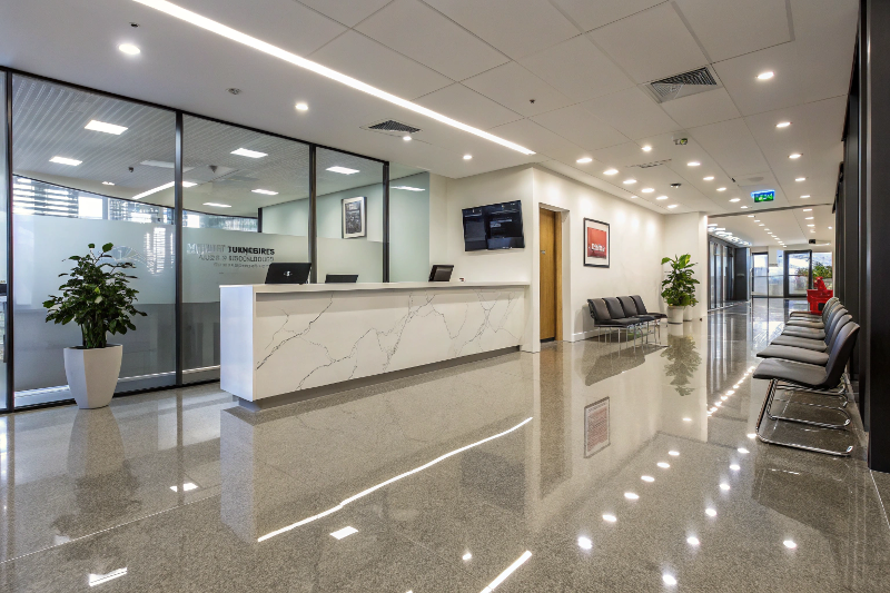 Professional office reception area with glossy epoxy flooring in Sutherland Shire workspace