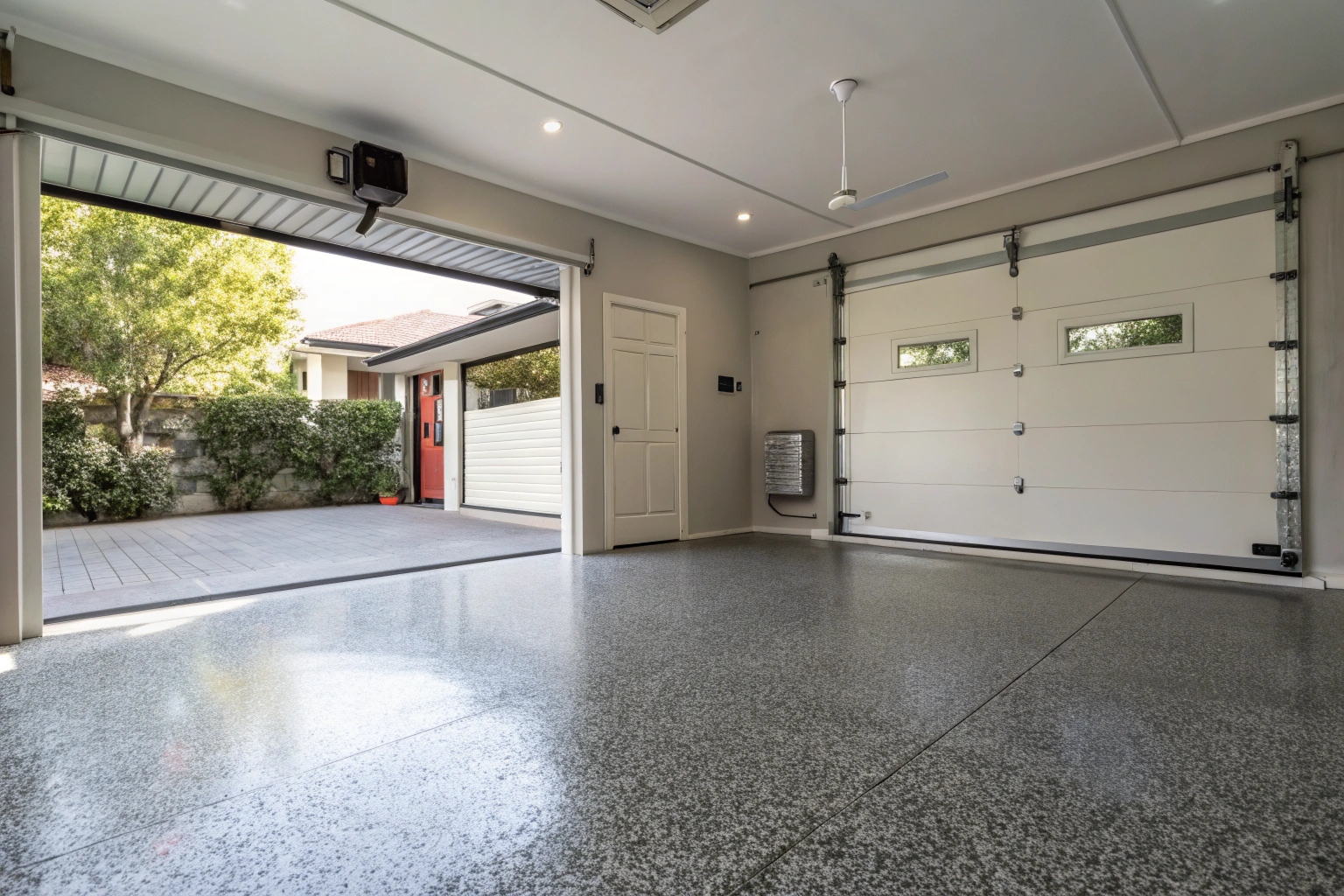 Non-slip epoxy coating on residential garage floor in Sutherland